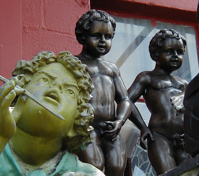 Open mouth statue face and manneken pis