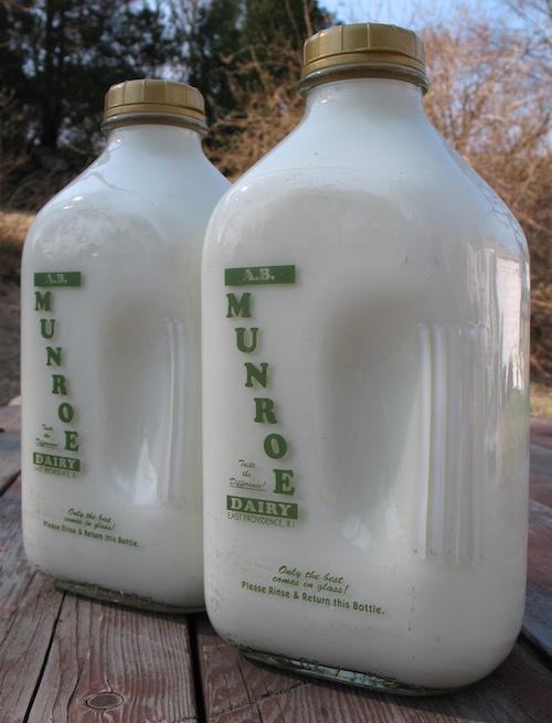 Two half-gallon bottles of Munroe Dairy milk