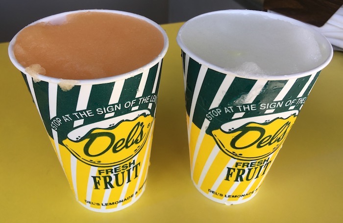 Two cups of Del's on a counter